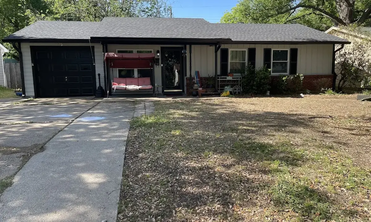 Wind Damage Roof Repair crew at work on a residential roof in Southern Pines